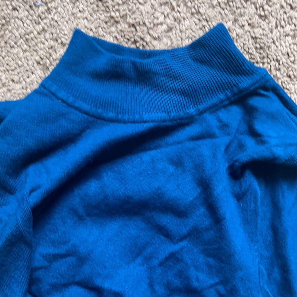 Gorgeous blue sleeveless turtle neck sweater